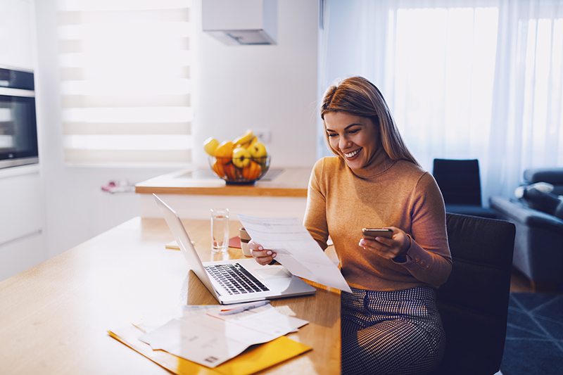 woman looking at her finances