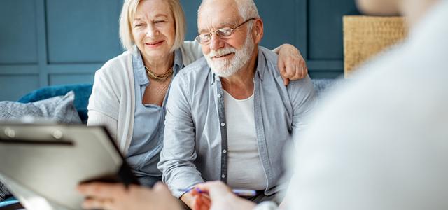 retired couple at financial advisor meeting